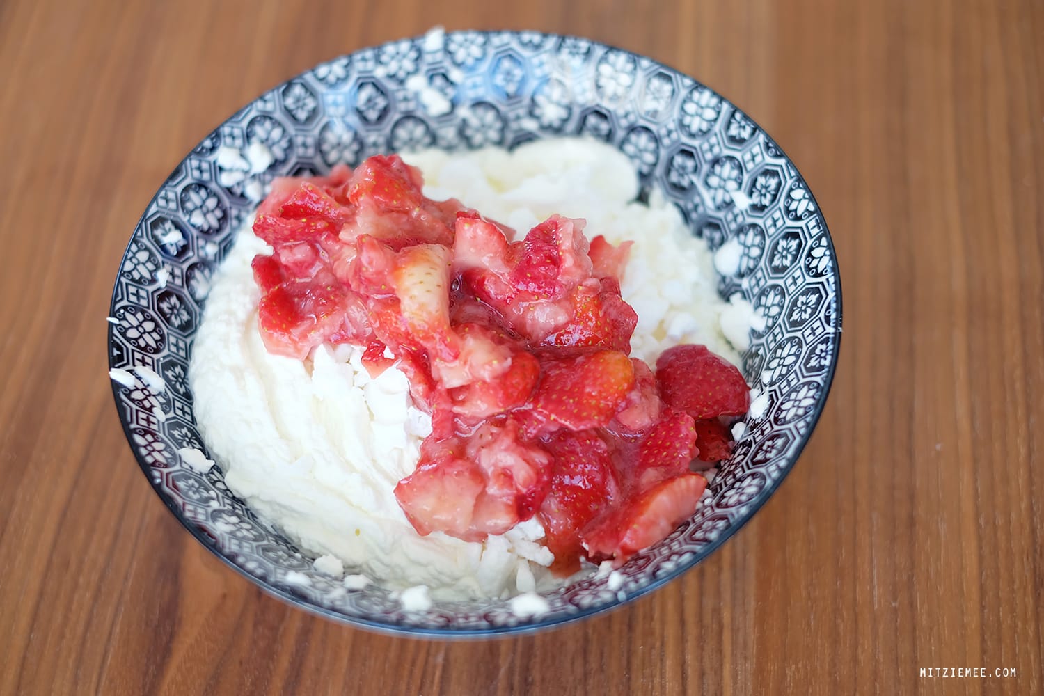 Whipped cream and strawberries