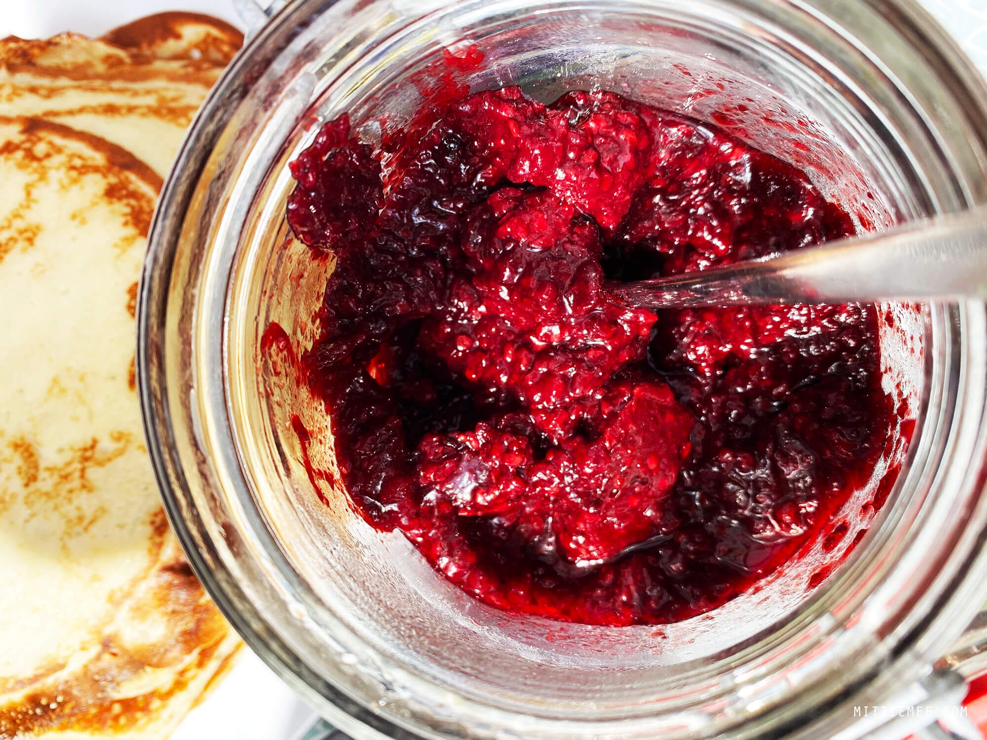 Danish crepes, pandekager, with blackberry jam and vanilla ice cream
