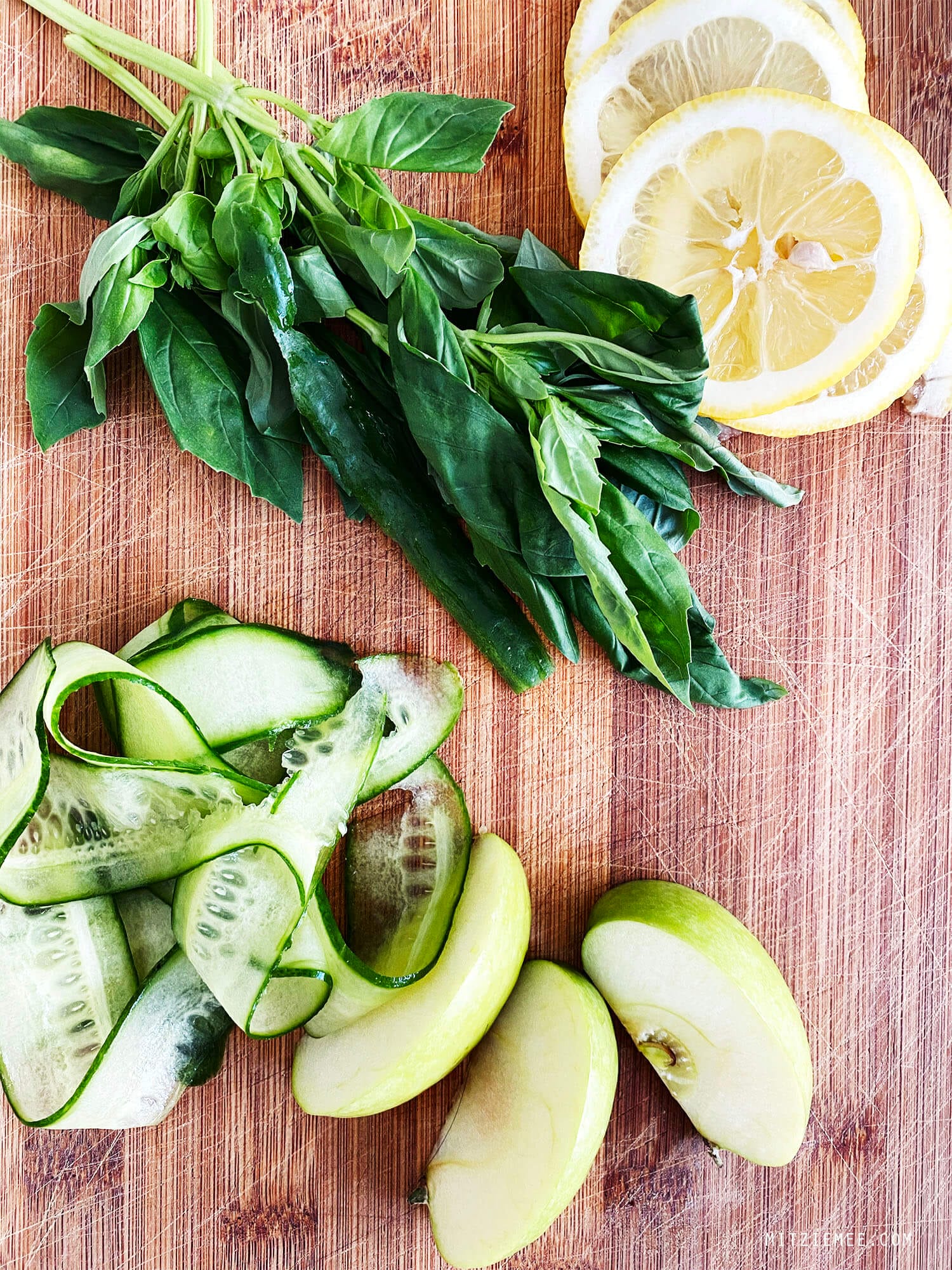 Infused water with green apples, basil, cucumber and lemon