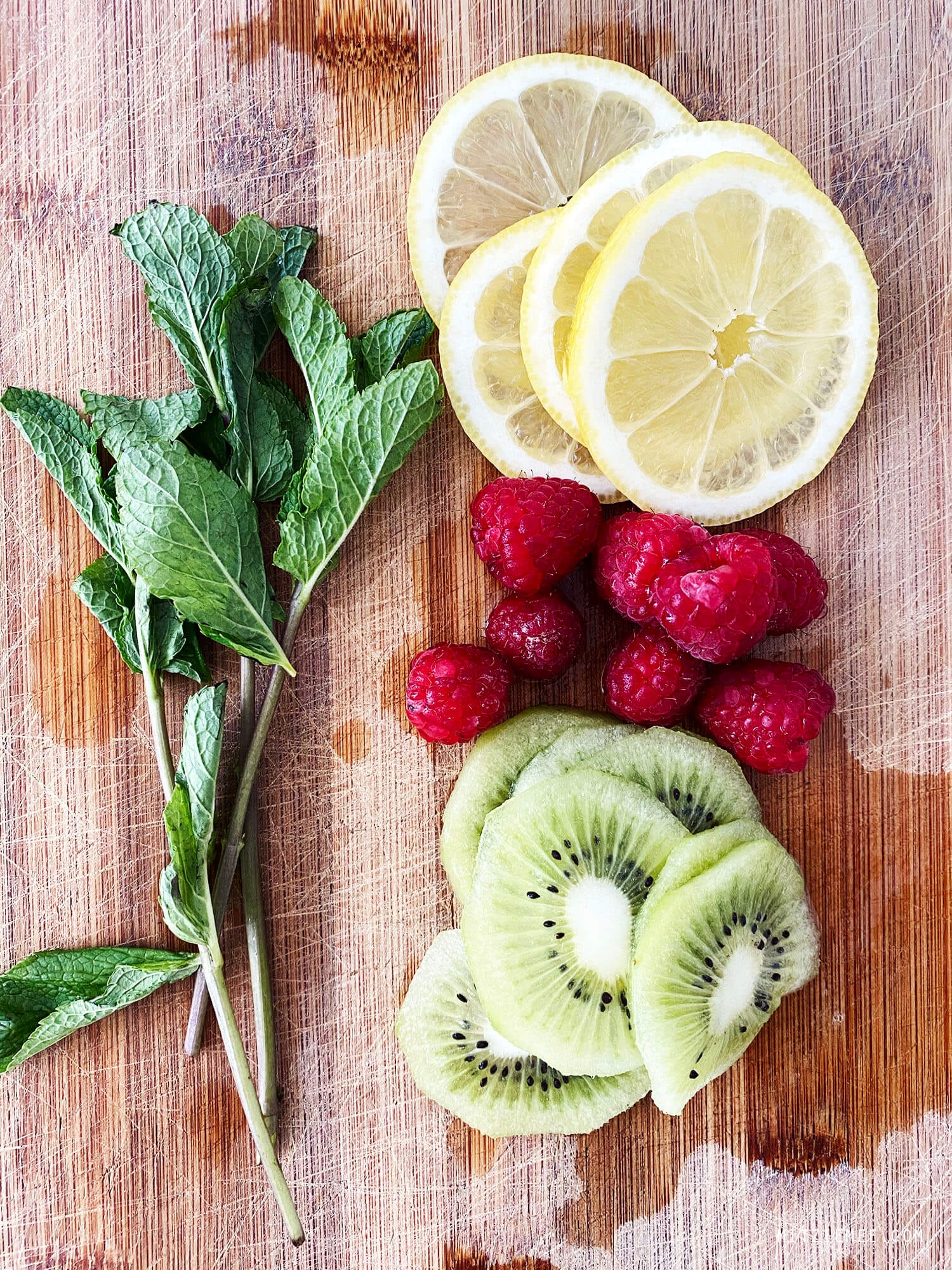 Infused water with raspberry, mint, kiwi and lemon