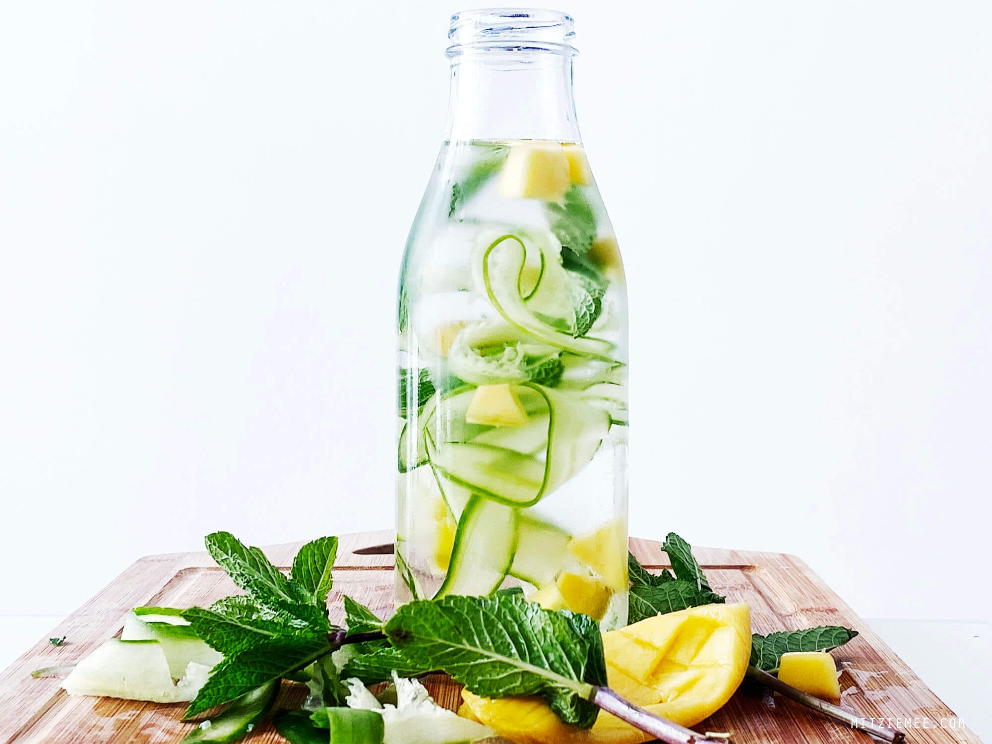 Infused water with mango, mint and cucumber