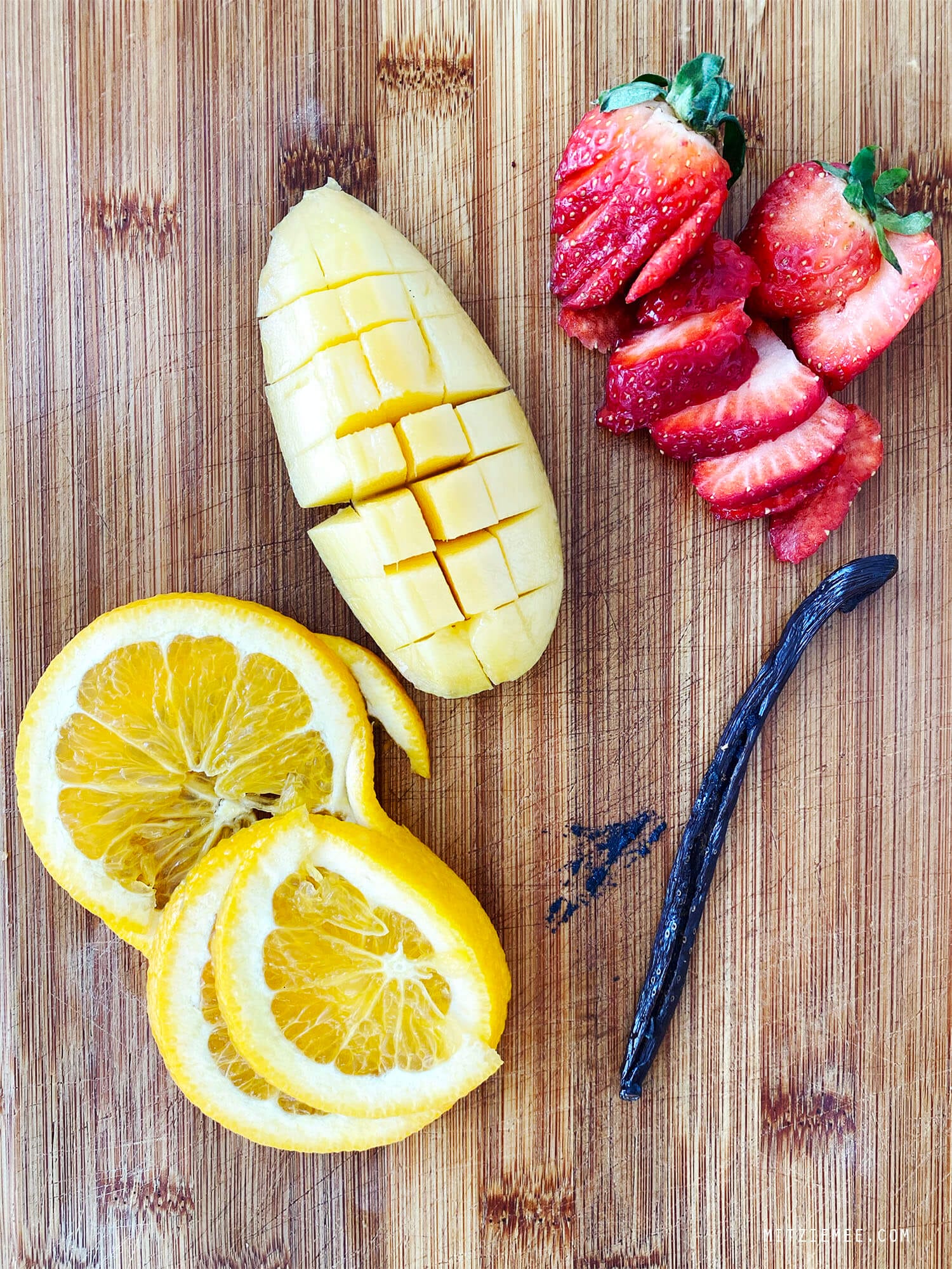 Infused water with strawberry, lemon, mango and vanilla