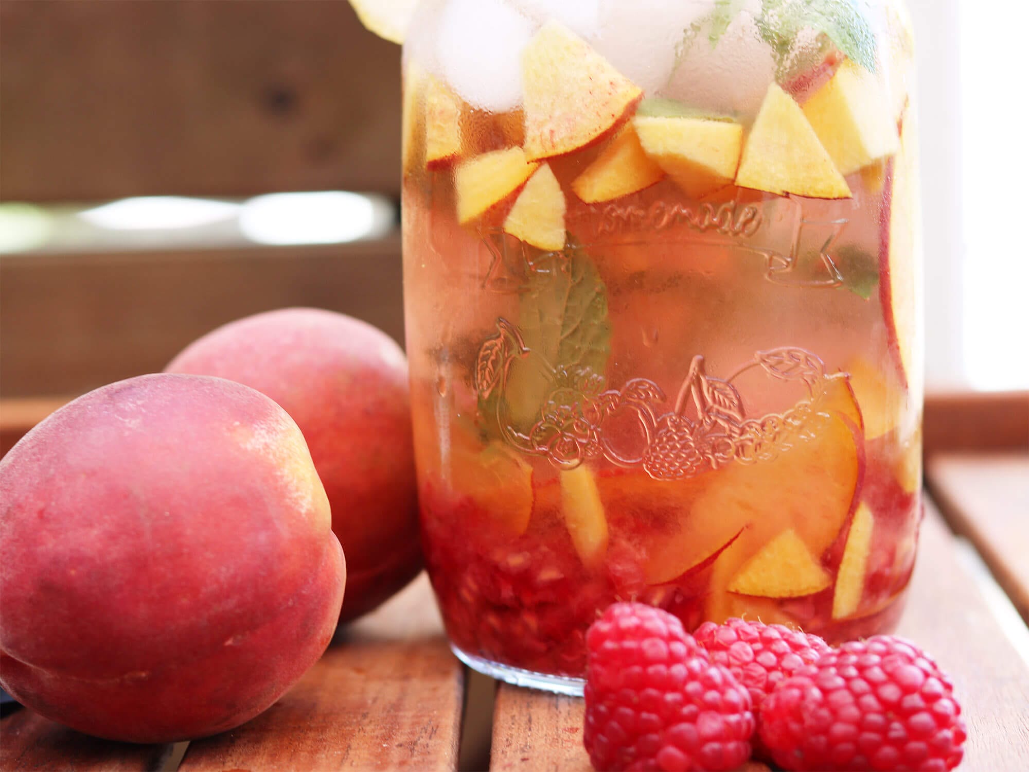 Recipe: Sparkling iced tea with peach and raspberries