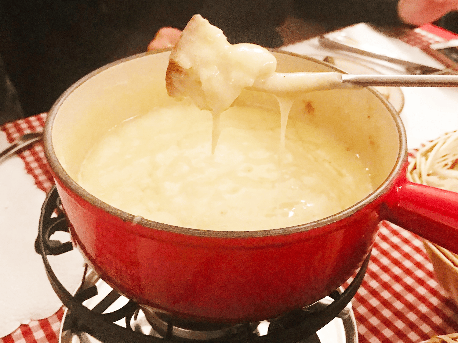 My Guide to Swiss Fondue: History, How to Eat It, and Where to Find the Best